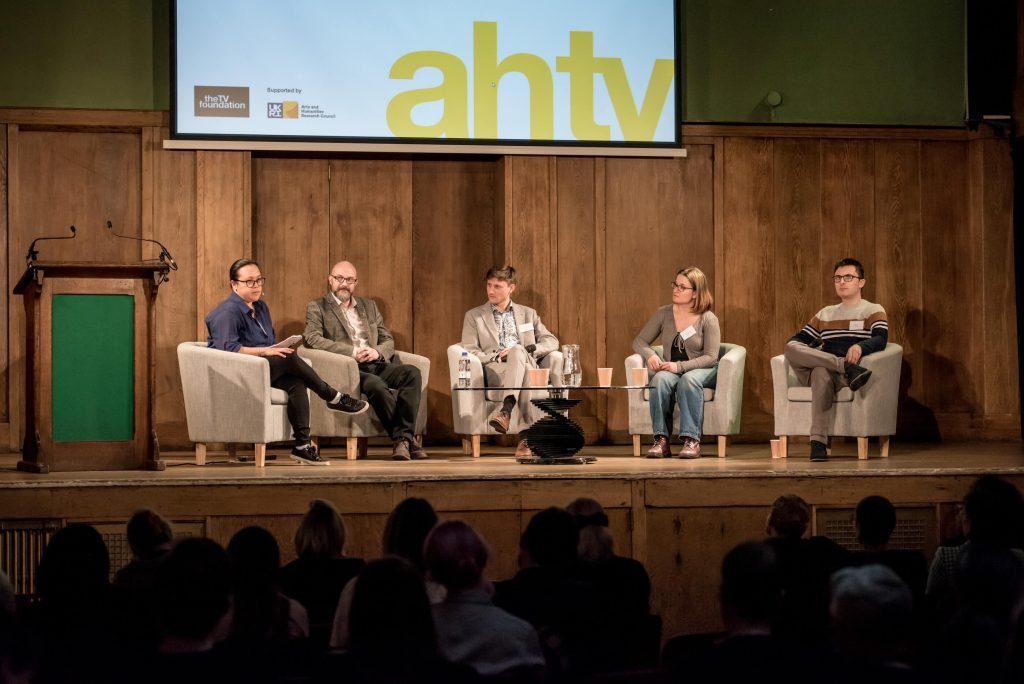 A panel of five people sat onstage at AHTV